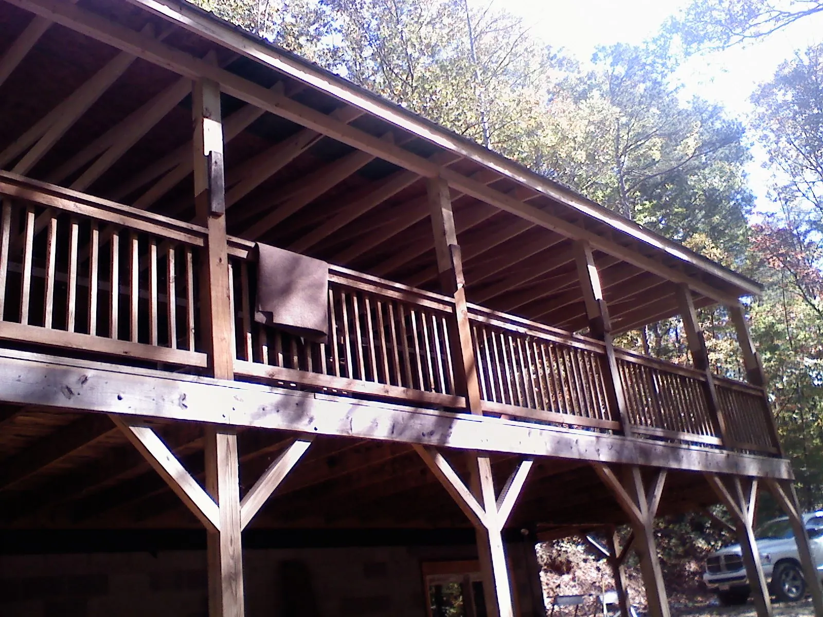 Timber framing under a new elevated porch and deck — Roof Leak Repair in Felda by Roofing Brothers